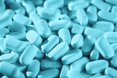 Background of blue monochrome tablets on the table Stock Photos
