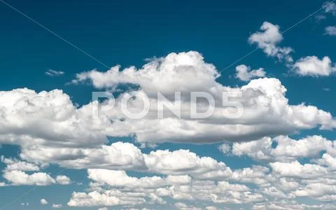 Background of blue sky and clouds Stock Photos