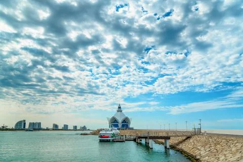 Background of blue sky with beautiful clouds and azure sea with Marina in the Stock Photos
