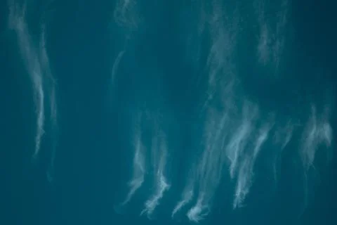 Background Blue sky with clouds of unusual color, texture Stock Photos