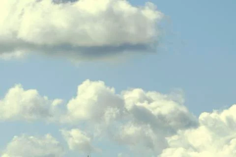 Background of blue sky with few clouds . Stock Photos