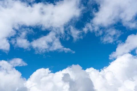 Background from the blue sky in the gap of white clouds a beautiful view Stock Photos