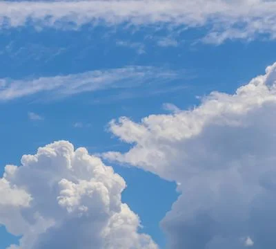 Background of blue sky with white clouds Stock Photos
