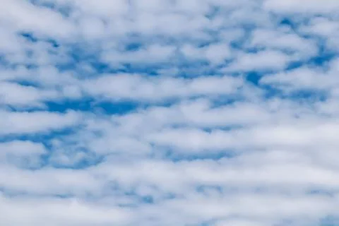Background of blue sky with white clouds Stock Photos