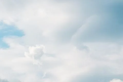 Background of blue sky with white clouds Stock Photos