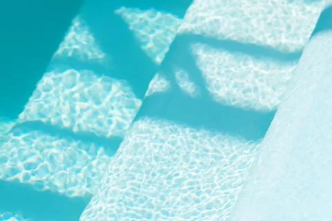 Background of the blue swimming pool Stock Photos
