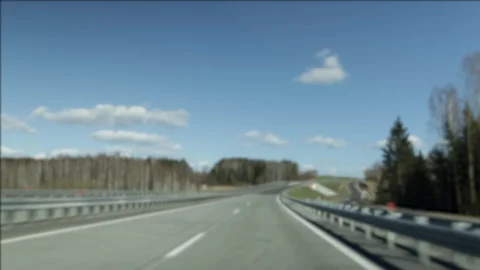 Background blur and defocus, highway, cars and freight transport on a sunny day. Stock Footage 129921405