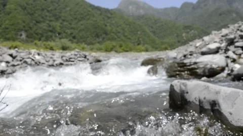 Background blure view of mountain river with green forest Stock Footage 240390515