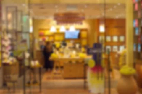 Background blurred abstract image of a cosmetics shop in the Mall. 스톡 사진