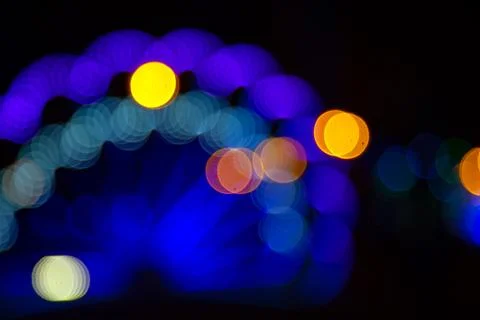 Background blurred abstraction of colored lanterns and decorations. bokeh t.. Stock Photos