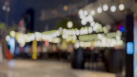 Background blurred bokeh at night, in front of pub and restaurant. Stock Footage 270153568