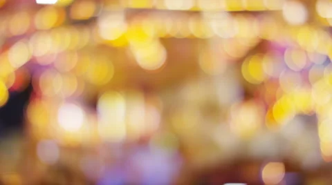 Background of blurred carousel lights, in slow motion Stock-Footage 58559977