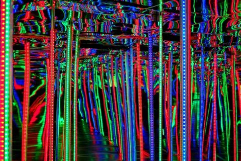 Background of blurred lines of neon light with track Stock Photos