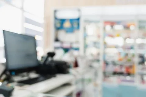 Background of blurred qualified pharmacy abstract background with drugs on shelf Foto stock