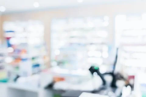 Background of blurred qualified pharmacy abstract background with drugs on shelf Foto stock