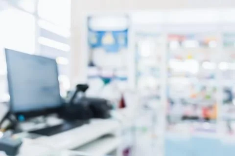 Background of blurred qualified pharmacy abstract background with drugs on shelf Foto stock