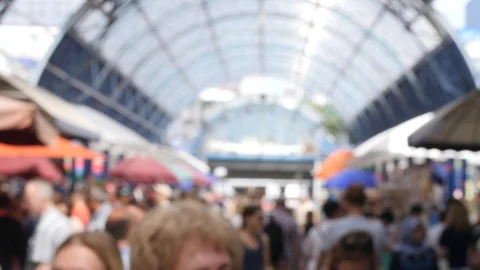 Background blurred video of the shopping arcade in the city market in the summer Stock Footage 103978054