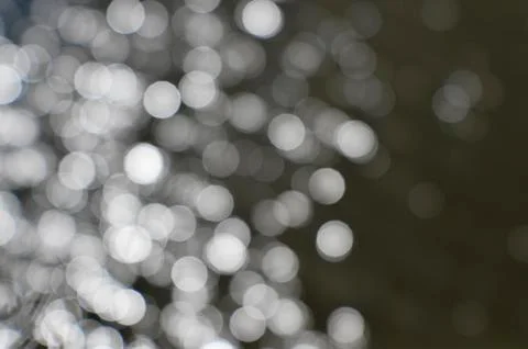 Background of blurry lights smooth side of neutral tones and color Stock Photos
