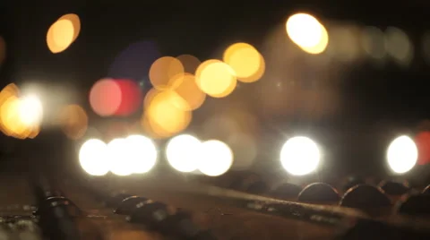 Background bokeh highlights a passing car Stock Footage 54766701