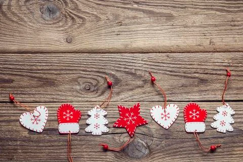 Background with a border of Christmas decorations on an old wooden table. Spa Stock Photos