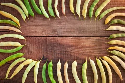 Background with a border of a String beans. Healthy food. String beans, green Stock Photos