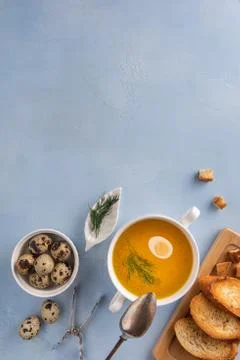 Background with bouillon, eggs, bread and spoon Stock Photos