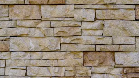 Background of brick stone wall texture. Close up image. Stock Photos
