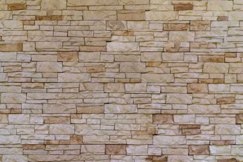Background of brick stone wall texture. Close up image. Stock Photos