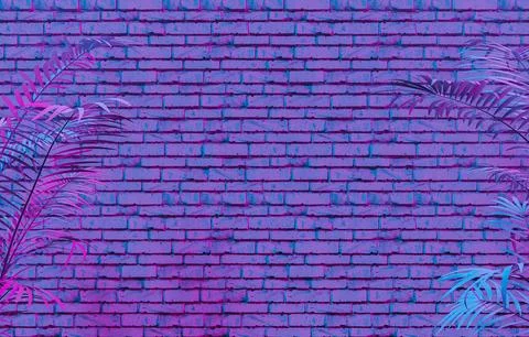 Background of brick wall and exotic plants in neon light Stock Photos