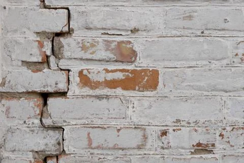 Background brick wall, brick closeup, gap between bricks Stock Photos