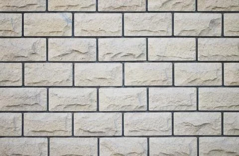 Background brick wall in a bright day Stock Photos