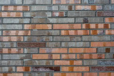 Background of a brick wall with different shades of red Stock Photos