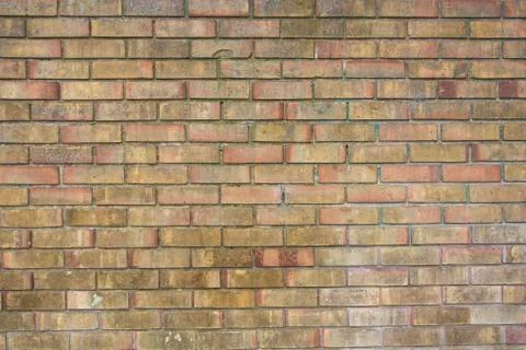 Background of brick wall texture. Old grunge outdoor orange stone texture, en Foto stock