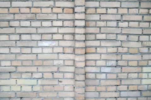 Background of bricks with one abnormal row, brick wall texture Stock Photos