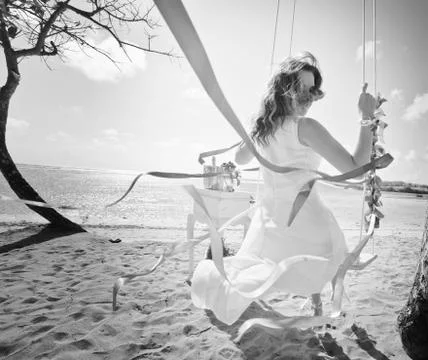 Background of bride ride on a swing Stock Photos