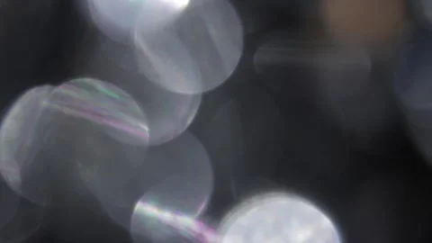 Background of bright lights next to Stockbeeldmateriaal 318675980