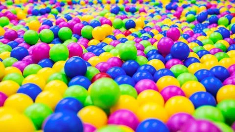 Background from bright multi-colored plastic balls 库存照片