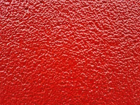 Background bright red wall with bulges Stock Photos