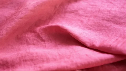 Background from bright satin fabric. close-up. fuchsia color. fabric texture. Видео 104609687