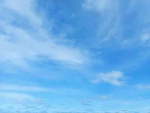 Background of bright sky and background of thin clouds, sky clouds, blue sky. Stock Photos