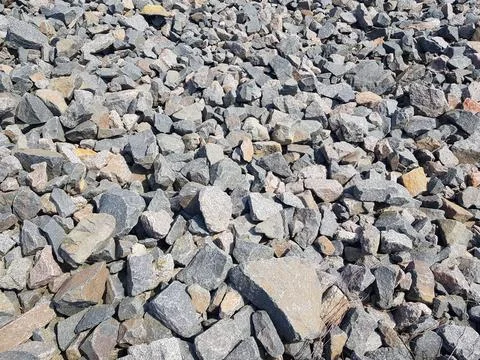 Background of broken stones close-up. Broken gravel texture Stock Photos
