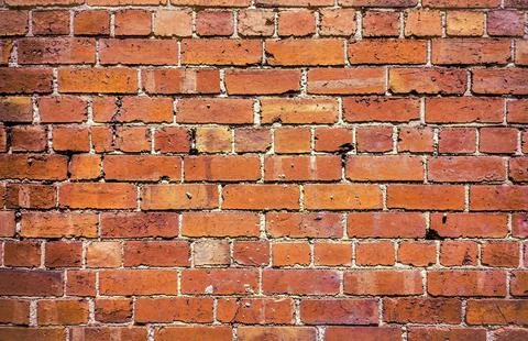 Background of brown and red rows of bricks Stock Photos