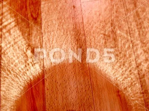 Background brown floor and sun glare around the circumference. Stock Photos