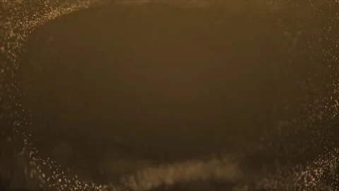 Background brown gold glittering particles, beautiful seamless  loopable Stock Footage 297427924