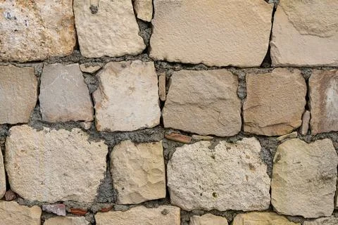 Background of brown-gray stone wall  . Pattern of slate wall texture and back Foto stock
