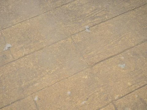 Background from brown tiles. Solid material pattern. Sidewalk surface in th.. Stock Photos