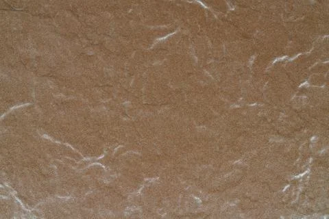 Background of brown wall tiles texture. Close up image. Stock Photos