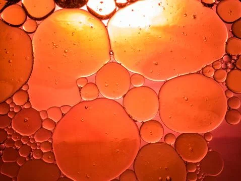 Background of bubbles and circles reddish tones Stock Photos