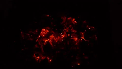 Background of burning coals in the dark. 4k Stock Footage 135430458