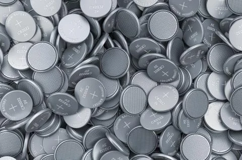 Background from button cells, 3D rendering Illustrazione stock